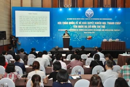 Quang cảnh Hội thảo Quốc tế về giải quyết khiếu nại, tranh chấp tên miền và sở hữu trí tuệ. (Ảnh: Minh Quyết/TTXVN)