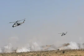 Máy bay trực thăng MI-35 của Nga tham gia một cuộc tập trận. (Nguồn: AFP/TTXVN)