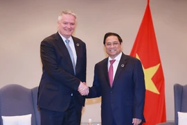 Thủ tướng Phạm Minh Chính tiếp Tổng Thư ký Tổ chức Hợp tác và Phát triển kinh tế (OECD) Mathias Cormann. (Ảnh: Dương Giang/TTXVN)