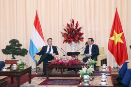 Chủ tịch UBND Thành phố Hồ Chí Minh Phan Văn Mãi tiếp Thủ tướng Đại công quốc Luxembourg Xavier Bettel (Ảnh: Xuân Khu/TTXVN)