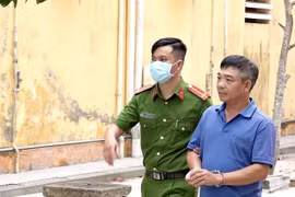 Lê Văn Trường được áp giải về nơi tạm giam. (Ảnh: TTXVN phát)