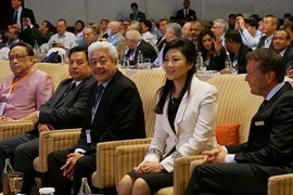 Thủ tướng Thái Lan Yingluck Shinawatra tới tham dự Đại hội báo chí thế giới lần thứ 65 tại Bangkok (Ảnh: Vietnam+)