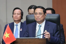 Thủ tướng Phạm Minh Chính phát biểu tại Hội nghị Cấp cao ASEAN-Ấn Độ lần thứ 20. (Ảnh: Dương Giang/TTXVN)