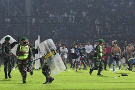 Thảm kịch ở Kanjuruhan đã cướp đi sinh mạng của ít nhất 131 người. (Ảnh: AFP/TTXVN)