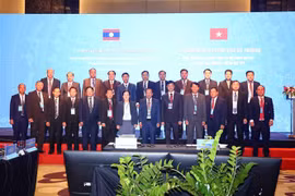Các đại biểu Bộ Công an hai nước tham dự hội nghị. (Ảnh: Phạm Kiên/TTXVN)