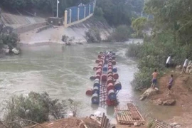 Bến sông nơi xảy ra vụ lật bè khiến ba người mất tích tại xóm Lũng Om, xã Đại Sơn, huyện Phục Hòa, Cao Bằng. (Ảnh: TTXVN phát)