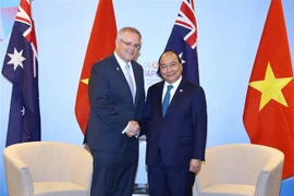 Thủ tướng Nguyễn Xuân Phúc gặp Thủ tướng Australia Scott Morrison bên lề Hội nghị Cấp cao ASEAN lần thứ 33 và các hội nghị cấp cao liên quan tại Singapore tháng 11/2018. (Ảnh: Thống Nhất/TTXVN)