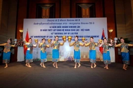 Lễ kỷ niệm 42 năm ngày Quốc khánh Lào. (Ảnh: An Đăng/TTXVN)