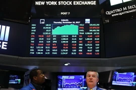 Giao dịch viên tại Sàn giao dịch chứng khoán New York, Mỹ. (Nguồn: AFP/TTXVN)