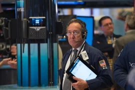 Giao dịch viên tại Sàn giao dịch chứng khoán New York, Mỹ. (Nguồn: AFP/TTXVN)