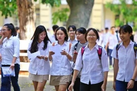 Thí sinh dự thi Trung học phổ thông quốc gia . (Ảnh: Minh Sơn/Vietnam+)