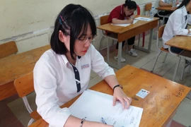 Thí sinh tham dự kỳ thi Trung học phổ thông quốc gia. (Ảnh: Phạm Mai/Vietnam+)