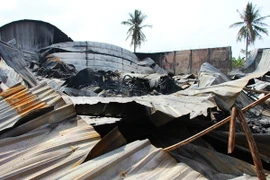 Hiện trường vụ cháy. (Ảnh: Huỳnh Thế Anh/TTXVN)