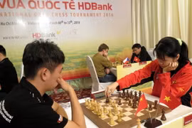 Trận đấu giữa kỳ thủ nữ số 1 Việt Nam Phạm Lê Thảo Nguyên và kỳ thủ Wang Hao (Trung Quốc). (Ảnh: Hoàng Hải/TTXVN)