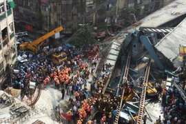 Hiện trường vụ sập cầu ở Ấn Độ. (Nguồn: cnn.com)