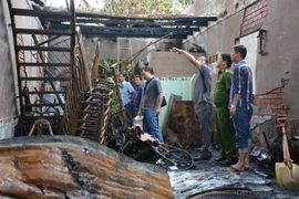 Hiện trường vụ cháy. (Ảnh: Huỳnh Thế Anh/TTXVN)