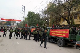 Công an Điện Biên ra quân bảo vệ an ninh trật tự kỳ bầu cử đại biểu Quốc hội. (Ảnh: Chu Quốc Hùng/TTXVN)