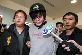 Nghi can chặt đầu bé gái bị đánh đập. (Nguồn: shanghaiist.com)