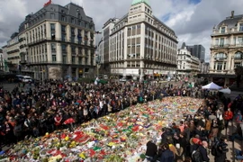 Tưởng niệm các nạn nhân vụ khủng bố tại Brussels. (Nguồn: AFP/TTXVN)