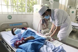 Nâng cao chất lượng y tế cơ sở góp phần giảm tải cho các bệnh viện tuyến trên. (Ảnh: Đinh Hằng/TTXVN)