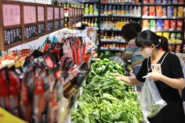 ADB: Người dân hạn chế mua sắm kìm hãm đà phục hồi của Trung Quốc