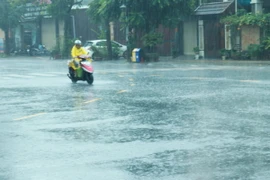 Mưa lớn ở thành phố Đông Hà (Quảng Trị) vào sáng 19/9. (Ảnh: Nguyên Lý/TTXVN)