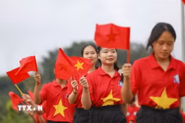 Học sinh trong ngày khai giảng năm học mới. (Ảnh: TTXVN)