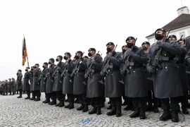 Binh sỹ Đức tham gia một buổi lễ của tân binh ở thành phố Munich. (Ảnh: AFP/TTXVN)