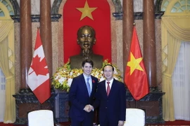 Chủ tịch nước Trần Đại Quang tiếp Thủ tướng Canada Justin Trudeau. (Ảnh: Nhan Sáng/TTXVN)