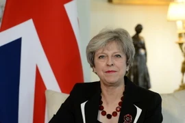Thủ tướng Anh Theresa May phát biểu tại một hội nghị ở London. (Nguồn: AFP/TTXVN)