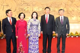 Chủ tịch Quốc hội Nguyễn Thị Kim Ngân và Tổng Bí thư, Chủ tịch Trung Quốc Tập Cận Bình đến dự lễ Khánh thành Cung Hữu nghị Việt-Trung và Lễ khai trương Trung tâm Văn hóa Trung Quốc tại Hà Nội. (Ảnh: Trọng Đức/TTXVN)