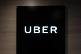 Biểu tượng Uber tại văn phòng ở Hong Kong, Trung Quốc. (Nguồn: AFP/TTXVN)
