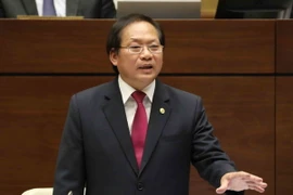 Bộ trưởng Bộ Thông tin và Truyền thông Trương Minh Tuấn trả lời chất vấn của đại biểu Quốc hội. (Ảnh: Phương Hoa/TTXVN)