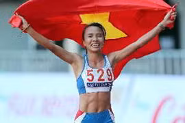 VĐV Phạm Thị Bình xuất sắc đoạt Huy chương Vàng nội dung Marathon nữ 42km. (Ảnh: Quang Nhựt/TTXVN) 