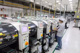 Hoạt động sản xuất tại Công ty Fuhong Precision Component tại Khu công nghiệp Đình Trám (vốn đầu tư của Đài Loan) tại Bắc Giang. (Ảnh: Danh Lam/TTXVN)