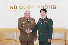 Đại tướng Lương Cường tiếp Bộ trưởng Bộ các Lực lượng vũ trang Cách mạng Cuba Álvaro López Miera. (Ảnh: Trọng Đức/TTXVN)