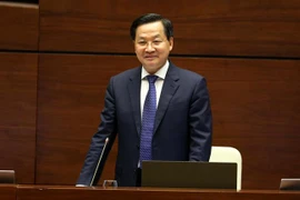 Phó Thủ tướng Lê Minh Khái trả lời chất vẫn. (Ảnh: An Đăng/TTXVN)