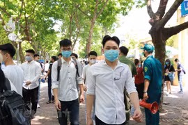 Thí sinh dự thi tốt nghiệp trung học phổ thông. (Ảnh: Hiếu Hoàng/Vietnam+)