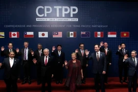 Đại diện các nước tại lễ ký thỏa thuận CPTPP ở Santiago, Chile. (Nguồn: AFP/TTXVN)