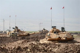 Binh sỹ Thổ Nhĩ Kỳ tham gia cuộc diễn tập tại cửa khẩu Habur ở biên giới Thổ Nhĩ Kỳ-Iraq ngày 27/9/2017. (Nguồn: AFP/TTXVN)