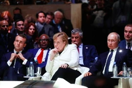 Thủ tướng Đức Angela Merkel (giữa) tại Diễn đàn Hòa bình Paris, Pháp ngày 11/11/2018. (Ảnh: AFP/TTXVN)