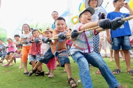 Các em nhỏ hào hứng tham gia các hoạt động trong ngày hội ''Phú Mỹ Hưng hướng về trẻ em năm 2018''. (Ảnh: Thế Anh/TTXVN)