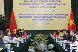 Thứ trưởng Bộ Ngoại giao Việt Nam Vũ Hồng Nam và Quốc vụ khanh Bộ Ngoại giao và hợp tác quốc tế Maroc Mounia Boucetta chủ trì phiên họp chính thức Kỳ họp lần 4. (Ảnh: Lâm Khánh/TTXVN)