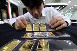 Tại sàn giao dịch vàng Hàn Quốc ở Seoul ngày 13/8. (Nguồn: YONHAP/TTXVN)