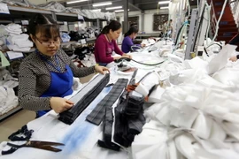 May hàng xuất khẩu. (Ảnh: Trần Việt/TTXVN)