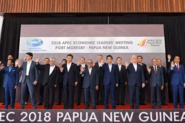 Lãnh đạo các nền kinh tế thành viên APEC chụp ảnh chung tại Hội nghị Cấp cao APEC ở Port Moresby, Papua New Guinea, ngày 18/11/2018. (Ảnh: AFP/TTXVN)