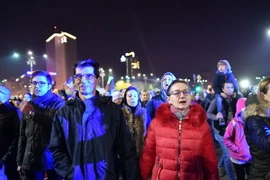 Người dân Romania biểu tình phản đối dự luật cải cách tư pháp của Chính phủ tại Bucharest. (Nguồn: AFP/TTXVN)