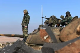 Binh sỹ quân đội Chính phủ Syria. (Nguồn: AFP/TTXVN)