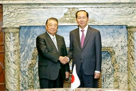 Chủ tịch nước Trần Đại Quang và Chủ tịch Hạ viện Nhật Bản Tadamori Oshima. (Ảnh: Nhan Sáng/TTXVN)