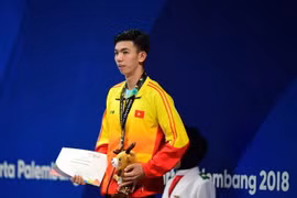 Vận động viên Nguyễn Huy Hoàng đoạt huy chương bạc nội dung bơi tự do 1.500m nam tại ASIAD 2018 diễn ra ở Jakarta, Indonesia ngày 24/8. (Ảnh: AFP/TTXVN)